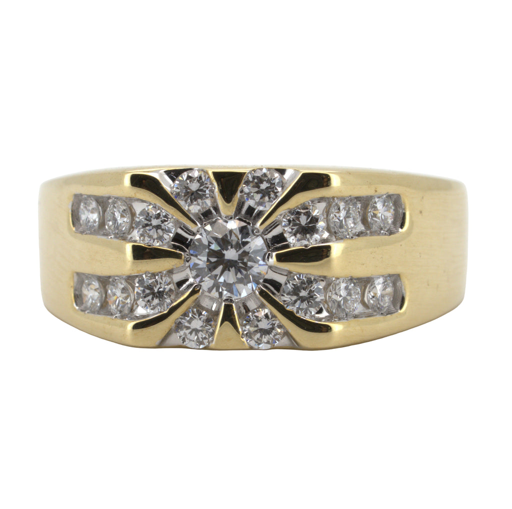 Gold ring with diamond accents on a white background